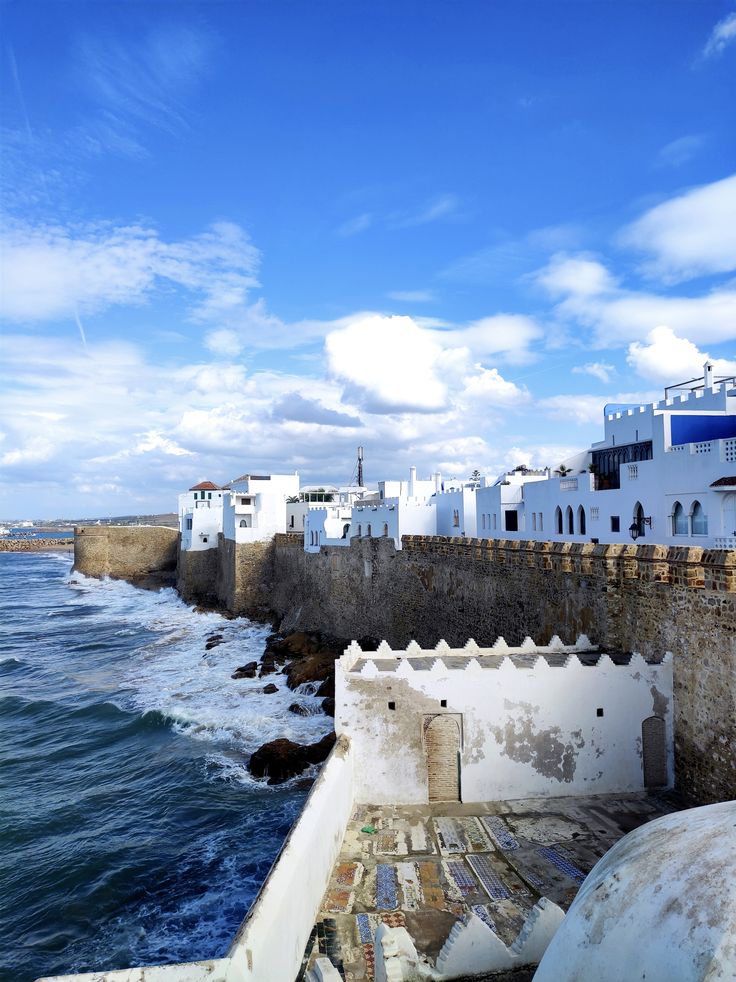 Whitewashed streets and medina walls of Asilah on the Atlantic coast of Morocco